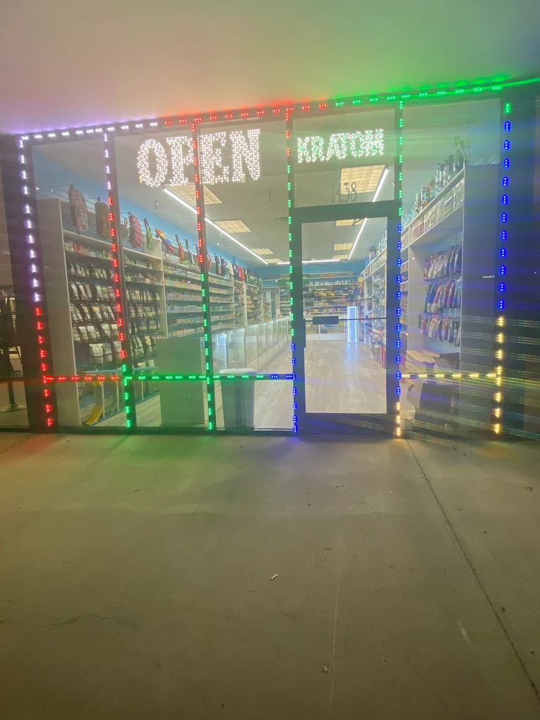 Asheboro Tobacco & Vape entrance at night
